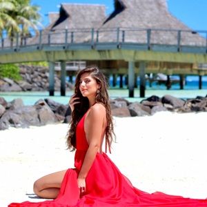 All eyes on you in this backless red maxi